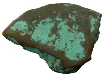 Četrtinski del bronaste pogače (ingota) najdenega na Arharjevi njivi ob vasi Trnje, 11.-10. stoletje pr. Kr. <em>Foto: Jože Štukl</em>