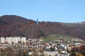 Puštal nad Trnjem pri Podlubniku, predel naselbine je označen z modro puščico.