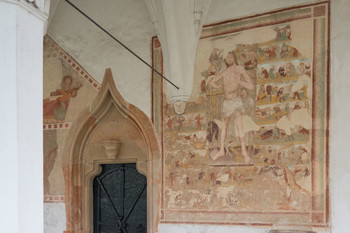 The monumental fresco on the west-facing exterior wall of the pilgrimage Church of the Annunciation in Crngrob depicts the Sunday Christ. <em>Photo: Jana Jocif</em>